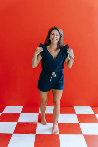 LILAH NAVY RUFFLE SLV ROMPER