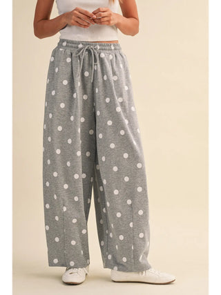 gray and white polka dot sweatpants with drawstring