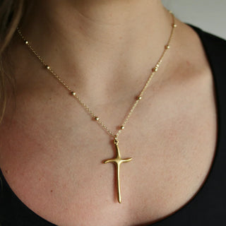 DELICATE GOLD BEAD CHAIN WITH LONGATED CROSS PENDANT 
