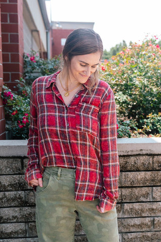 red and black plaid button-up shirt
