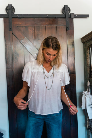 WHITE FLUTTER SLEEVE TOP