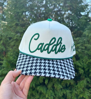 WHITE & BLACK PLAID HAT WITH GREEN CADDIE LOGO