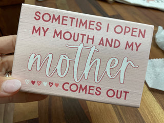 MOTHER COMES OUT SIGN