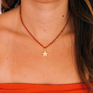 SMALL RED BEAD NECKLACE WITH GOLD STAR 