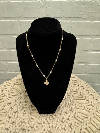 TINI CROSS NECKLACE