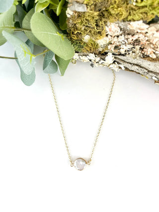 Gold necklace with a WHITE STONE PENDANT 