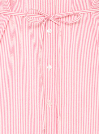 Close-up of a pink and white striped shirt with a bow tie 