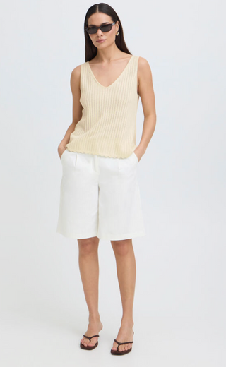 light yellow sleeveless top 