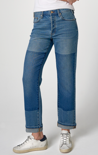 Medium blue denim jeans with color patch detail