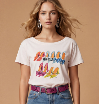 WHITE WIDE NECK GRAPHIC TEE WITH HIGH HEELS ON IT 