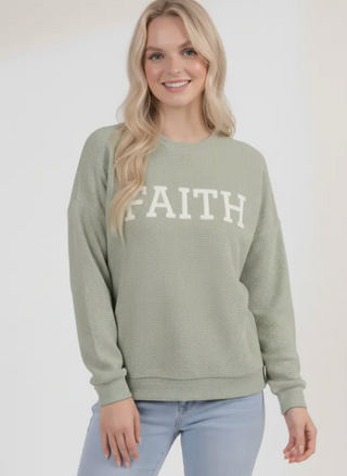 SAGE GREEN LONG SLEEVE SHIRT WITH THE WORD FAITH ON IT 