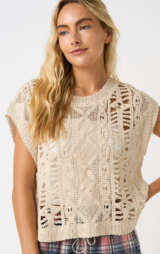 sleeveless crochet knit top with an intricate openwork pattern