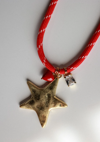 RED BRAIDED PARACORD NECKLACE WITH LARGE GOLD STAR AND SMALL CHARMS 