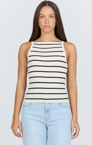 white  with black striped sleeveless top 