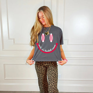 gray t-shirt with a smiley face design
