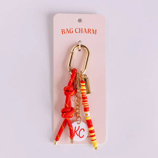 KC RED AND YELLOW BACG CHARM 