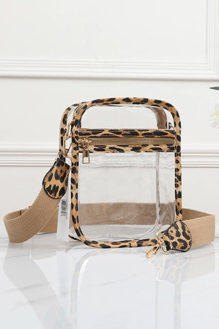 Clear handbag with leopard print handle and strap